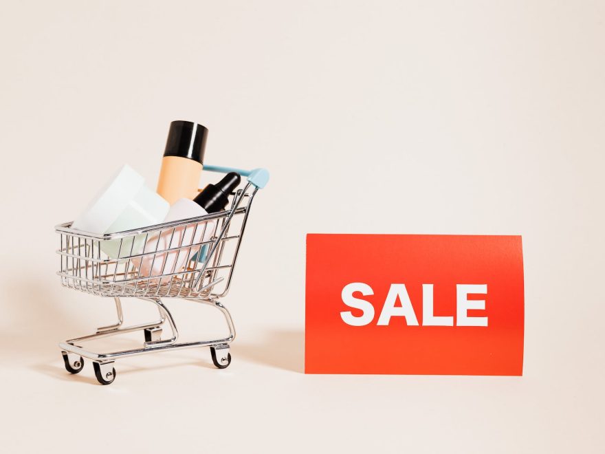 merchandise in a shopping cart on white background